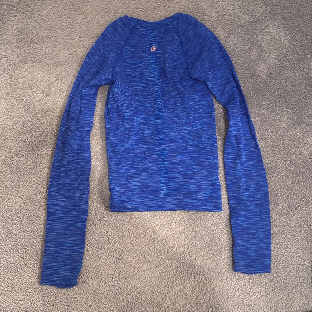 Lululemon swiftly tech limited edition with holographic Lululemon sign on back!